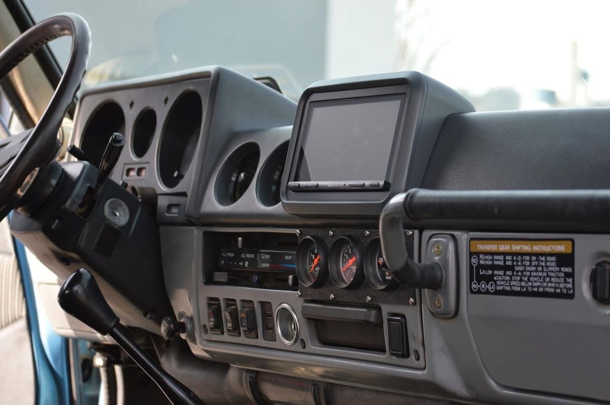 Dash with head unit and gauge pod