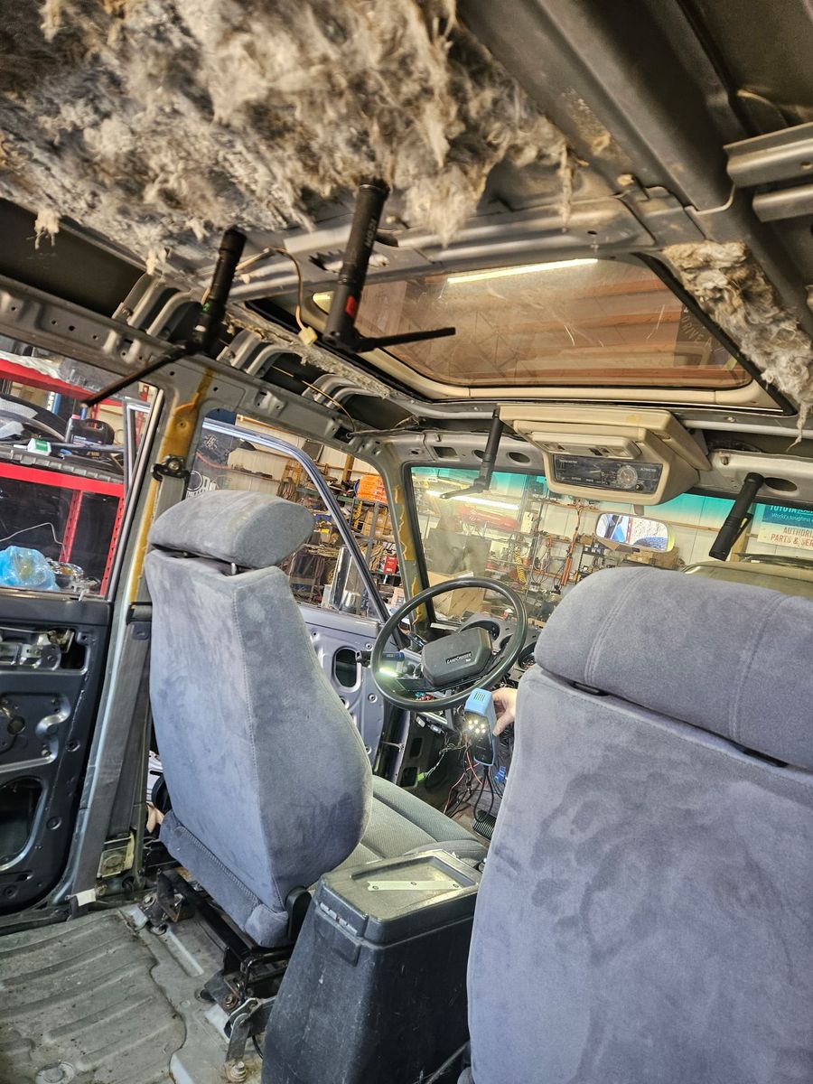 Interior from rear with headliner stripped