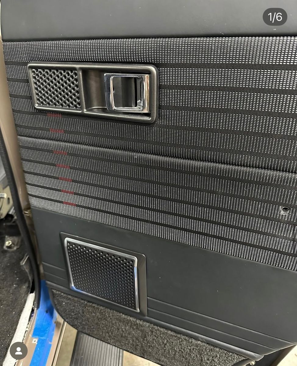 Door panel with speaker
